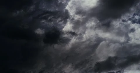 Clouds display an ominous structure with intense atmospheric turbulence. Stock Photos