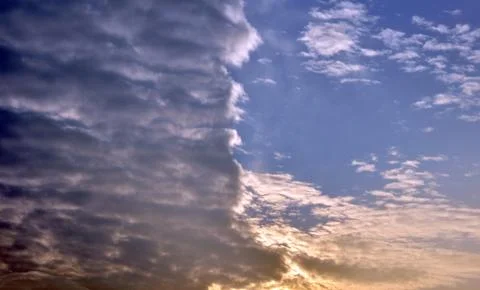 Clouds divided sky sunset colorful light dark 3 Stock Photos