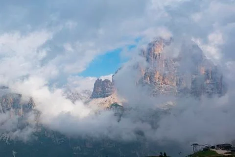 Clouds on the Dolomites three Stock Photos