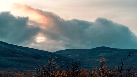 Clouds dramatic movement above mountains Stock Footage 116545703