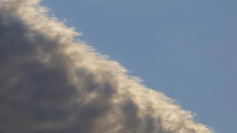 Clouds in the dramatic sky Stock Photos