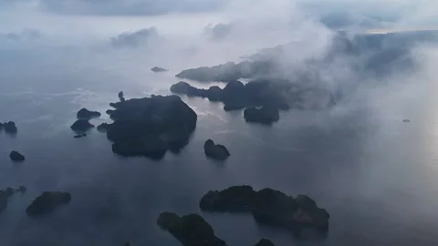 Clouds Drift Above Rock Islands in Raja Ampat Stock-Footage 325820955