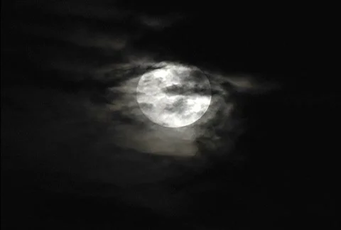 Clouds drift across full moon Stock Footage 275104