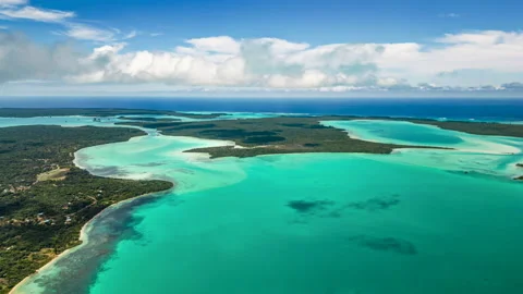 Clouds drift in the sky casting shadows on Saint Maurice Bay and Saint Stock Footage 221431026