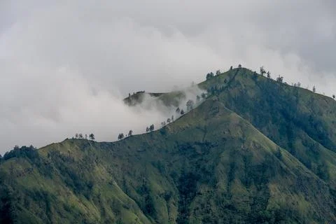 Clouds Drifting Across Mount Batur Ridges Stock Photos