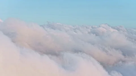 Clouds drifting across a serene sky, capturing a tranquil, dreamy atmosphere Stock Footage 312312776