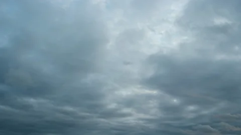 Clouds, drifting and billowing against a blue sky, in timelapse Stock-Footage 105757090