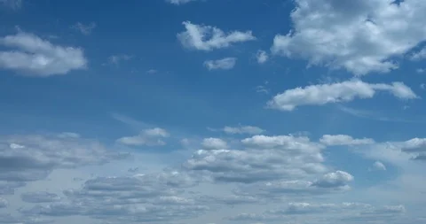 Clouds Drifting and Billowing in Timelapse Vídeos de archivo 99864440