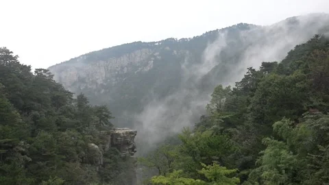 Clouds Drifting Between Granite Cliffs and Forested Peaks, Lushan Stock Footage 346733183