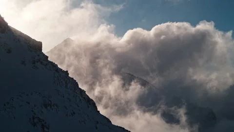Clouds Drifting Between Mont Gelé and Bec des Rosses in Verbier Switzerland Stock Footage 339045127