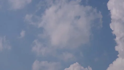 Clouds drifting in a blue sky over Bhimtal Video stock 334328382