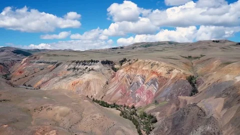 Clouds drifting, melting and growing in clear blue sky Stock Footage 77177573