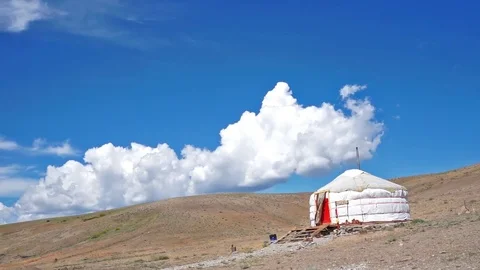 Clouds drifting, melting and growing in clear blue sky Stock Footage 77183004