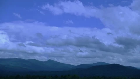 Clouds drifting over the Adirondack Mountains Stock Footage 156523804