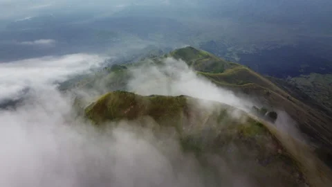 Clouds Drifting Over Narrow Mountain Ridge in Bali, Indonesia — Drone Flyover Vidéo 344104371