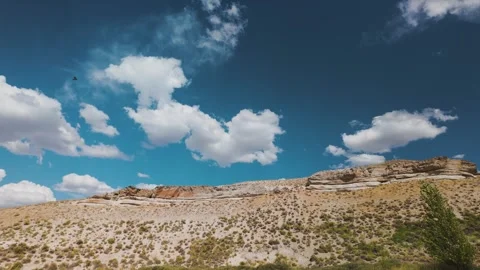 Clouds Drifting Over a Nevada Desert Mesa in Summer Stock Footage 317215519