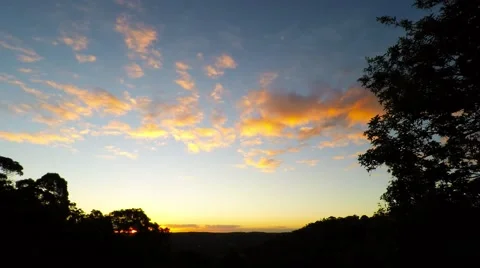 Clouds Drifting at Sunset over the Valley  Stock Footage 65109714