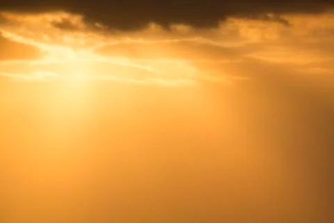 Clouds during beautiful orange sunset in Punta Sal (Mancora), Peru Stock Photos