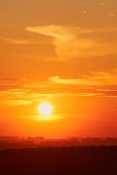 The clouds during the evening dusk were illuminated by the warm light of th.. Stock Photos