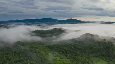 Clouds during sunrise above the mountain peak. Stock Footage 148426736