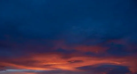 Clouds during sunset, orange Stock Photos