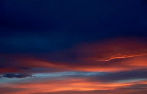 Clouds during sunset, orange Stock Photos