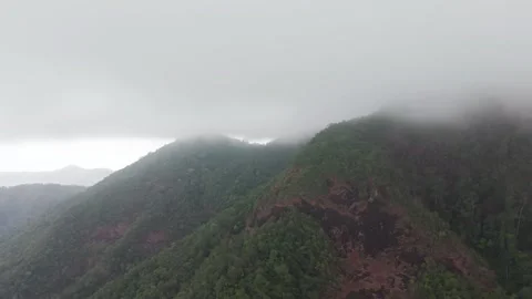 Clouds embracing lush tropical mountains in koh chang island Video stock 308952009