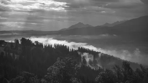 Clouds Engulfing Mountain Peaks Stock Footage 305458811