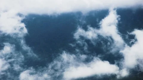 Clouds envelop the mountain slopes Video stock 151958576