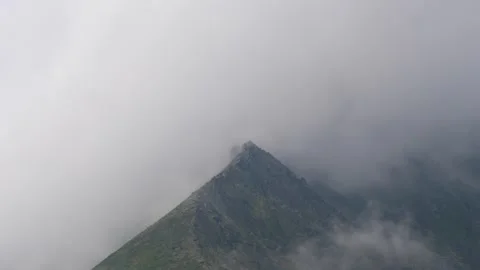 The clouds envelop the sky edge.  Time lapse. Subpolar Urals. Stock Footage 269133372
