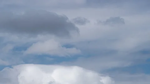 The clouds evaporation in the blue sky. time lapse 動画素材 132602845