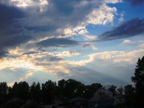 Clouds in the evening sky Stock Photos