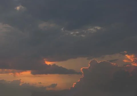 Clouds on evening sky Stock Photos