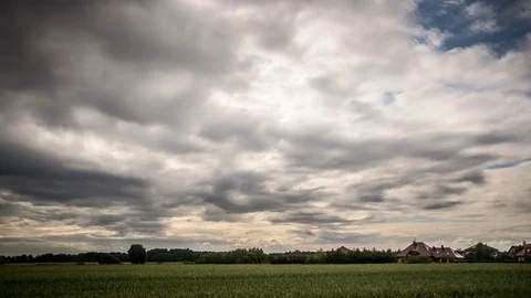 Clouds &amp; field timelapse Stock Footage 93781089