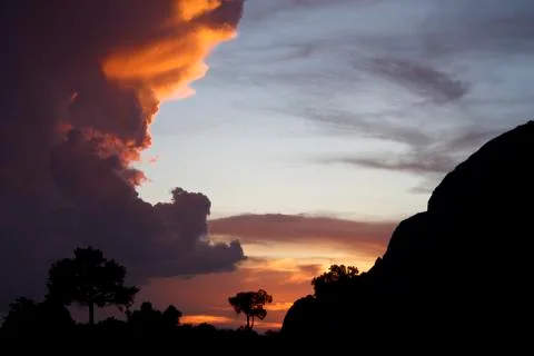 Clouds fill the sky at sunset Stock Photos