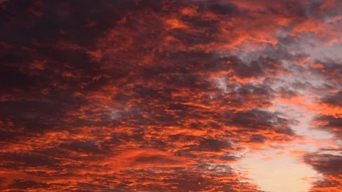 Clouds on fire sunset time lapse 4K Stockbeeldmateriaal 122293142