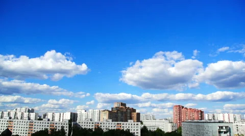 Clouds float above the houses Stock Footage 51932321