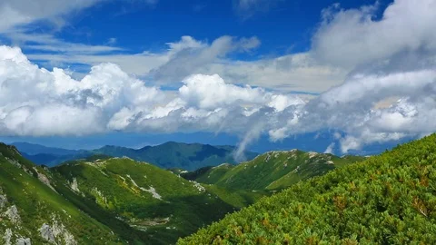 Clouds float above the mountain range. Time Lapse. Stock Footage 94569211