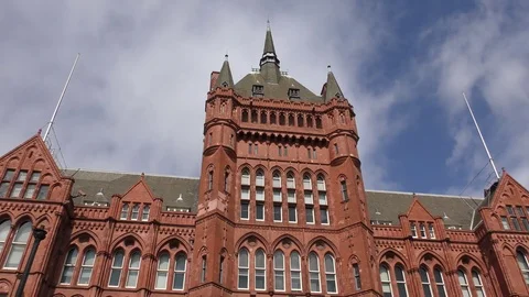 The clouds float above the old red building. Stock Footage 74609048