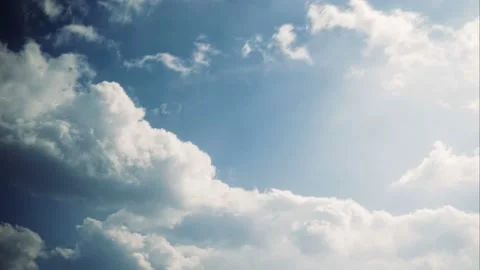 Clouds float Across the blue sky. timelapse Stock Footage 105858407