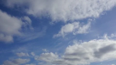 Clouds float across the blue sky. Timelapse Stock-Footage 334059453