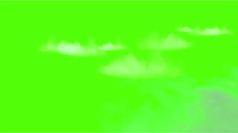 Clouds float across the sky, on a green background. Stock Footage 168186498