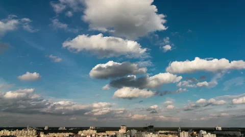 Clouds float across the sky over the city, timelapse Stock Footage 61882184