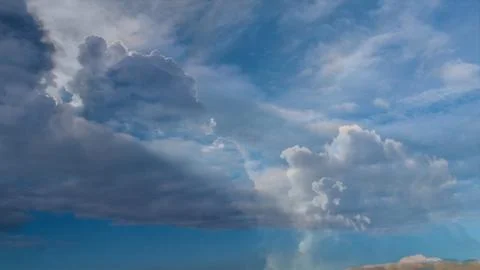 Clouds float across the sky Stock Photos
