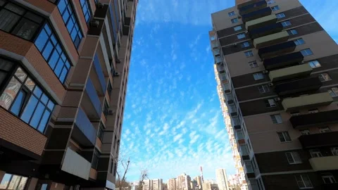 Clouds float among the houses Video stock 172284599