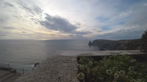 The clouds float beautifully above the sea. Stock Footage 100235927