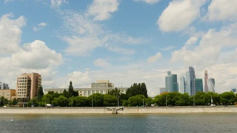 Clouds Float In The Blue Sky Over Moscow River And High Rise Buildings Moscow-Ci Stock Footage