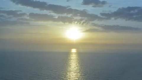 Clouds float in the blue sky over the sea Stock Footage 139163255