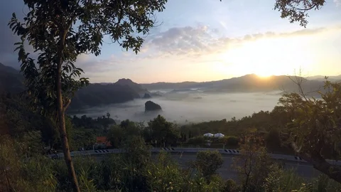 Clouds float on the morning valley Stock Footage 105981035