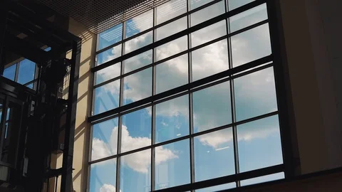 Clouds float outside the window buildings (Time lapse) Stock Footage 93748596